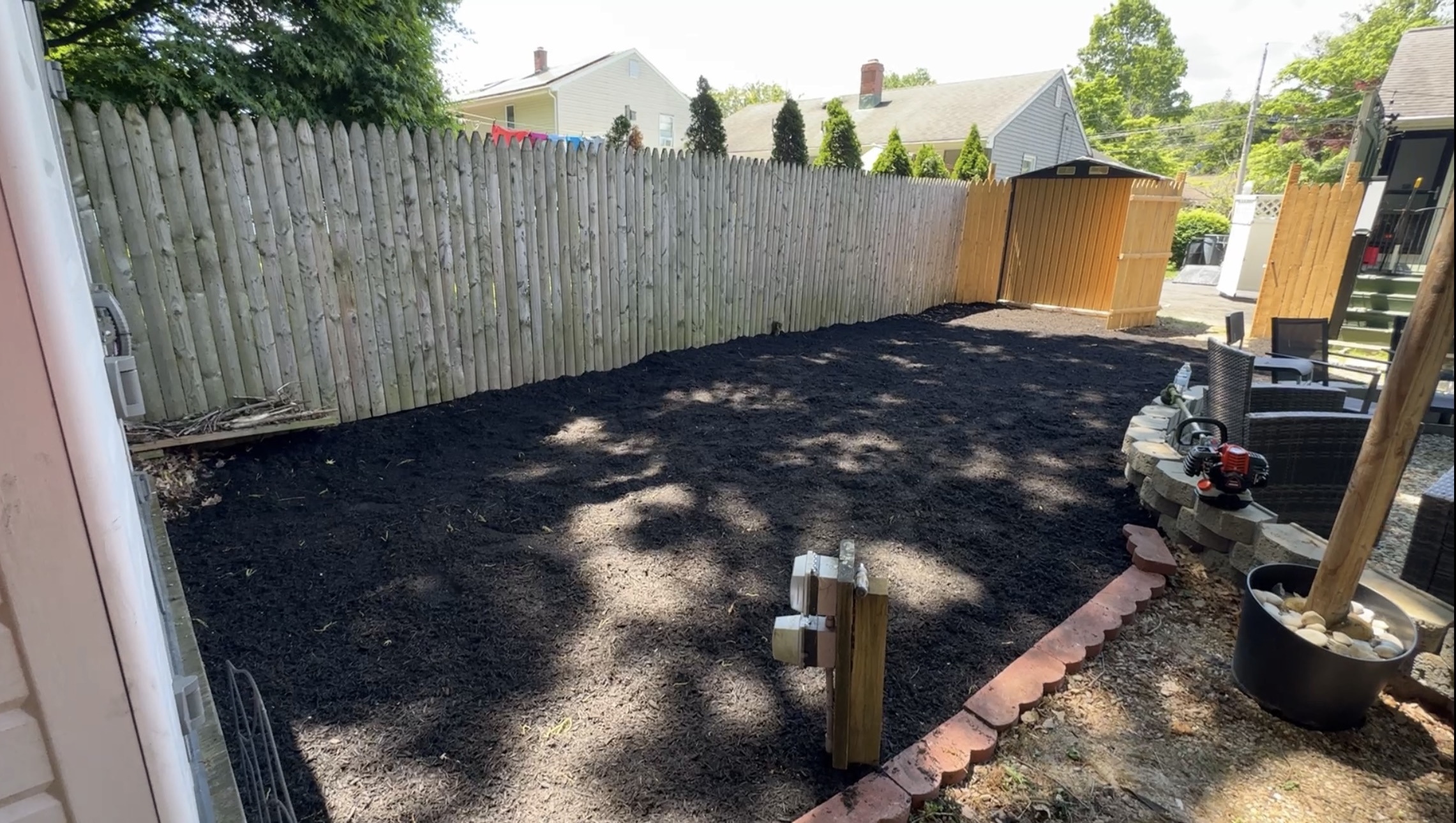 After — fresh black mulch installation by Sebs Landscaping & Masonry CT