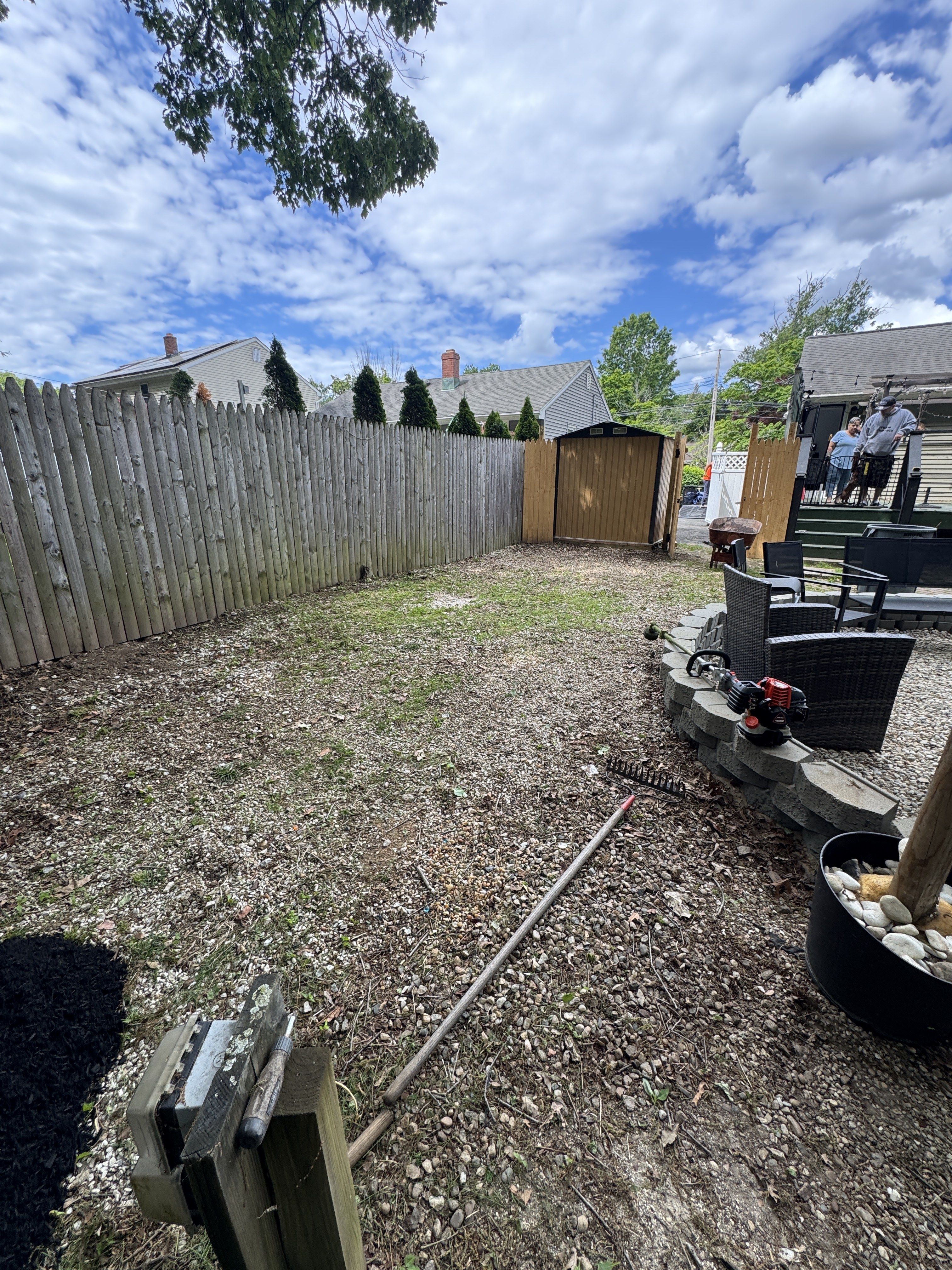 Before — bare Connecticut backyard prior to mulch installation